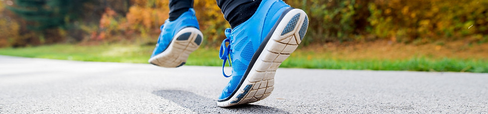 young-athlete-running-in-park-in-colorful-autumn-n-PMGH7NB.jpg